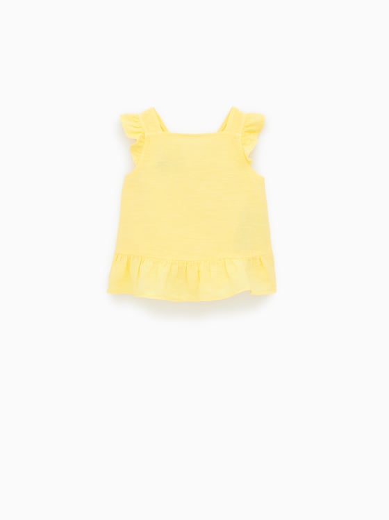 chemise structuree avec volant de Zara sur SCANDALOOK